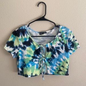 Cropped, short sleeve tie-dye top, two strings to tie in the front.